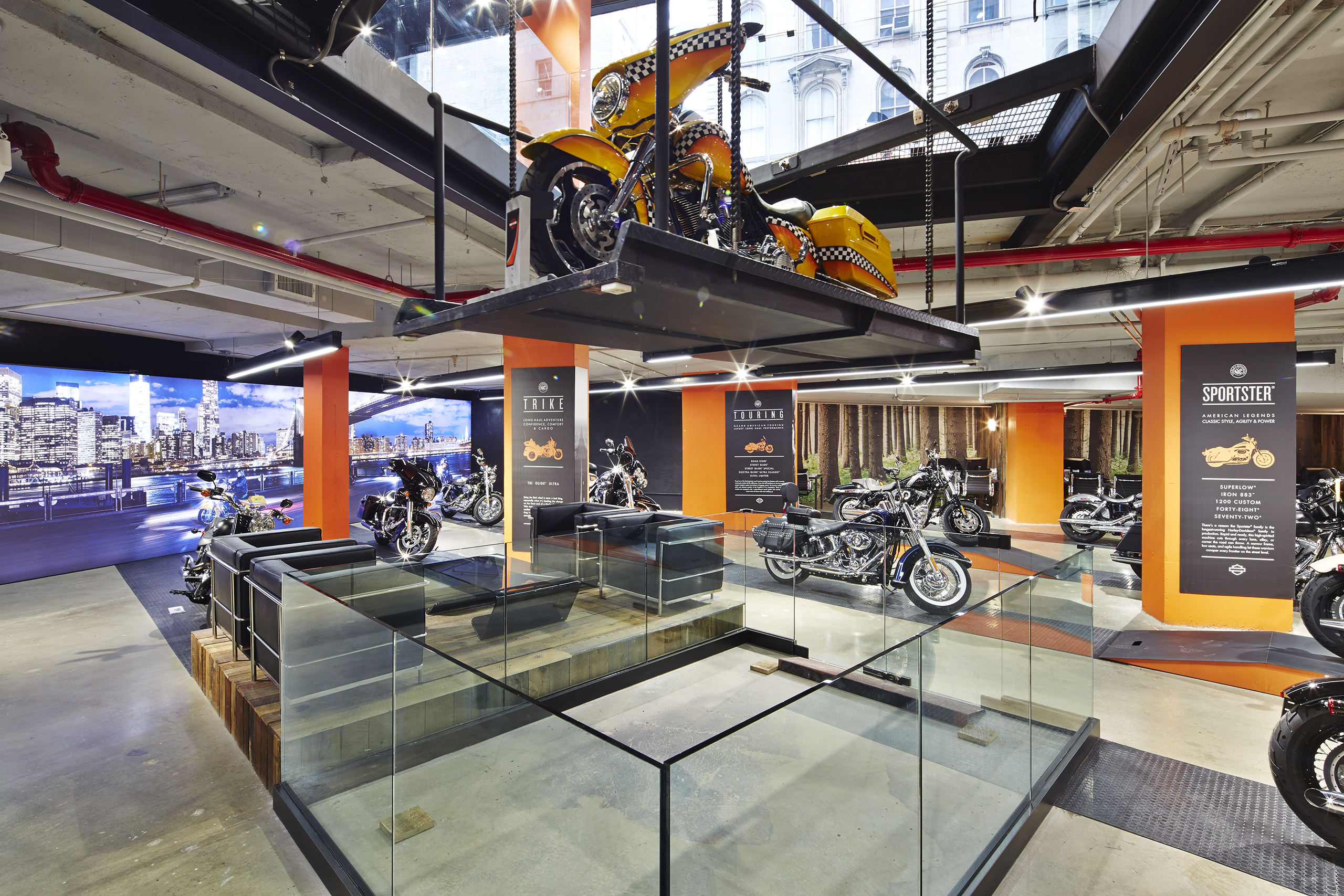 Motorcycle lift and showroom lounge