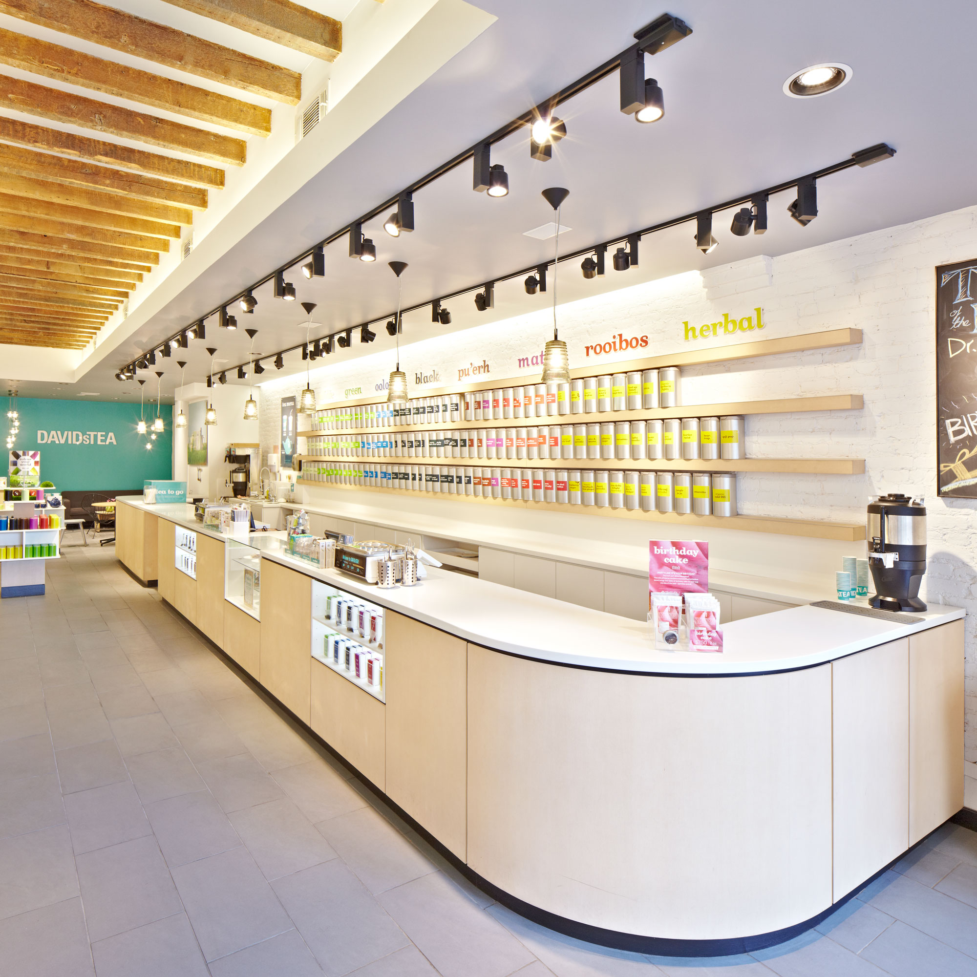  The Tea Wall behind the counter holds up to 120 varieties of straight teas and 