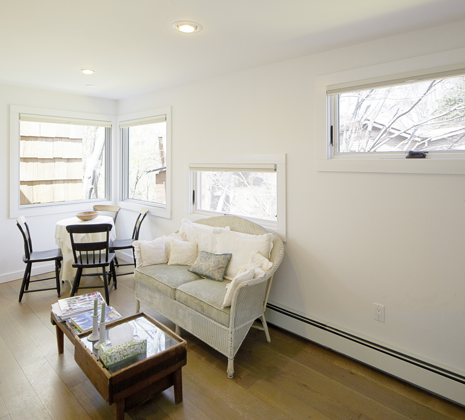 Variations in the guest suite windows allow for privacy at one end and a sitting